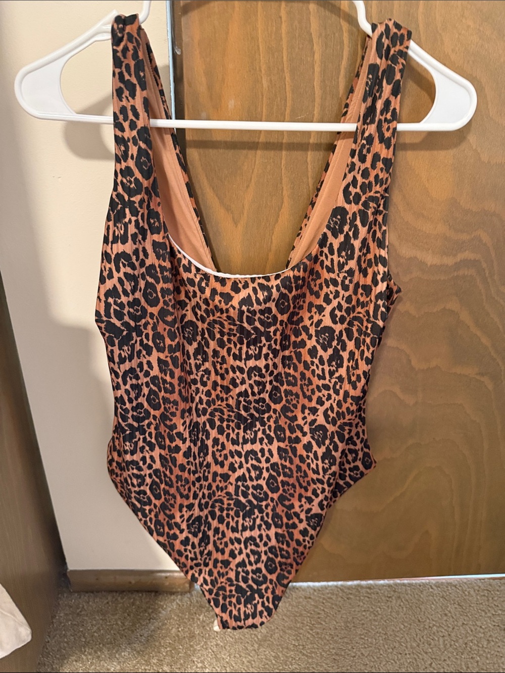 ASOS DESIGN Curve ribbed scoop neck swimsuit in leopard print